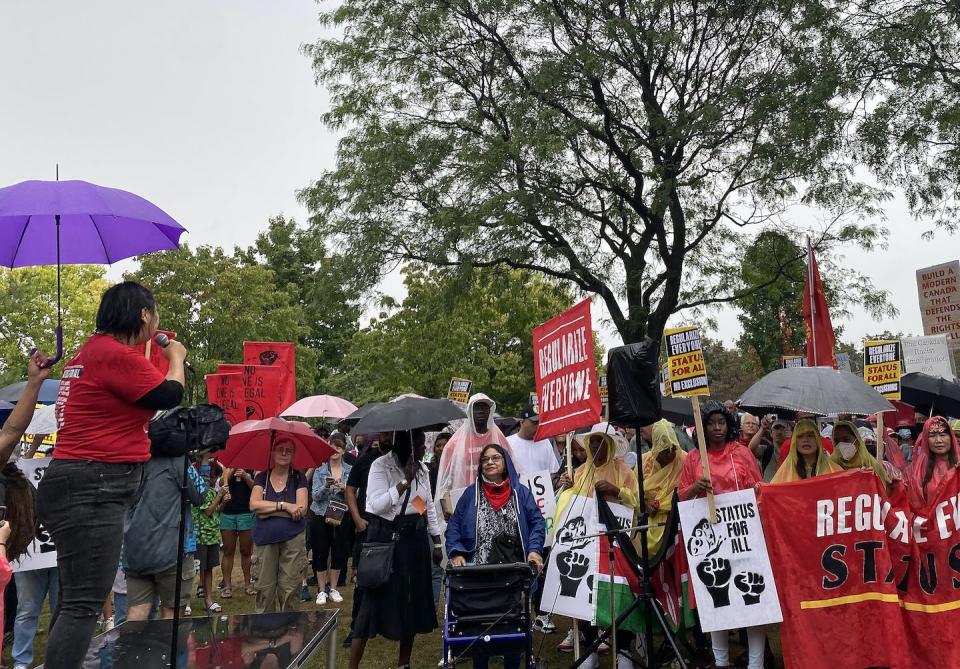 A rally for migrant rights in Christie Pits park in Toronto on Sept. 18, 2022, calling on the federal government to extend permanent status to undocumented people. THE CANADIAN PRESS/Holly McKenzie-Sutter