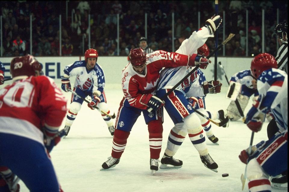 23 Feb 1992:  General view of the players in action during the Ice Hockey match between Canada and France at the 1992 Winter Olympic Games in Albertville, France. Canada won the match 3-2. \ Mandatory Credit: Rick  Stewart/Allsport