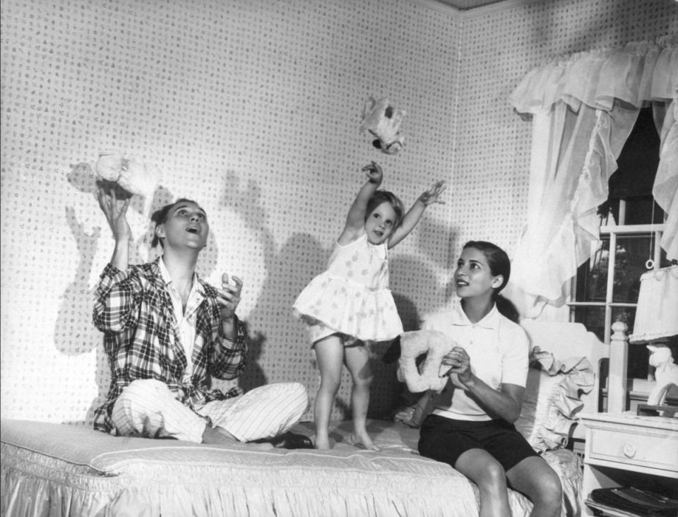 The Ginsburgs play with their 3-year old daughter, Jane, in her bedroom at Martin’s parents’ home in Rockville Centre, N.Y. (Photo: Supreme Court of the United States)