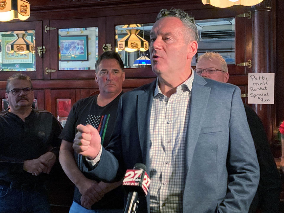 Republican candidate for Wisconsin governor Tim Michels speaks during a campaign stop at a bar on Tuesday, Oct. 4, 2022, in Baraboo, Wisc. Michels did not address a question about the GOP-controlled Legislature rejecting a move that would have created a way for voters to decide whether to keep the state’s abortion ban. The candidate said he would work with the Legislature on abortion and would sign a bill creating exceptions for victims of rape and incest that do not currently exist. (AP Photo/Scott Bauer)