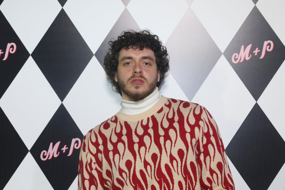 Jack Harlow wearing a red and white striped shirt.