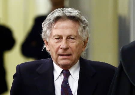 Filmmaker Roman Polanski arrives for a court hearing in Krakow February 25, 2015. Polanski appeared in a Polish court on Wednesday at a hearing to consider a U.S. request for his extradition over a 1977 child sex crime conviction. REUTERS/Kacper Pempel