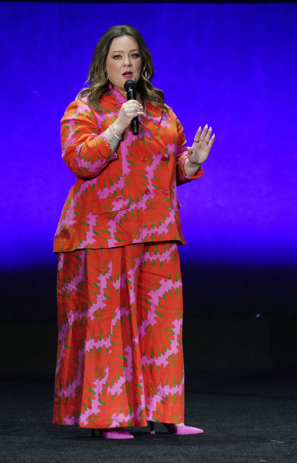 Melissa McCarthy, a cast member in the upcoming film "The Little Mermaid," introduces a clip from the film during the Walt Disney Studios presentation at CinemaCon 2023, the official convention of the National Association of Theatre Owners (NATO) at Caesars Palace, Wednesday, April 26, 2023, in Las Vegas. (AP Photo/Chris Pizzello)