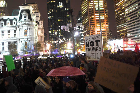 Protestors march against Trump's victory in Philadelphia. REUTERS/Mark Makela