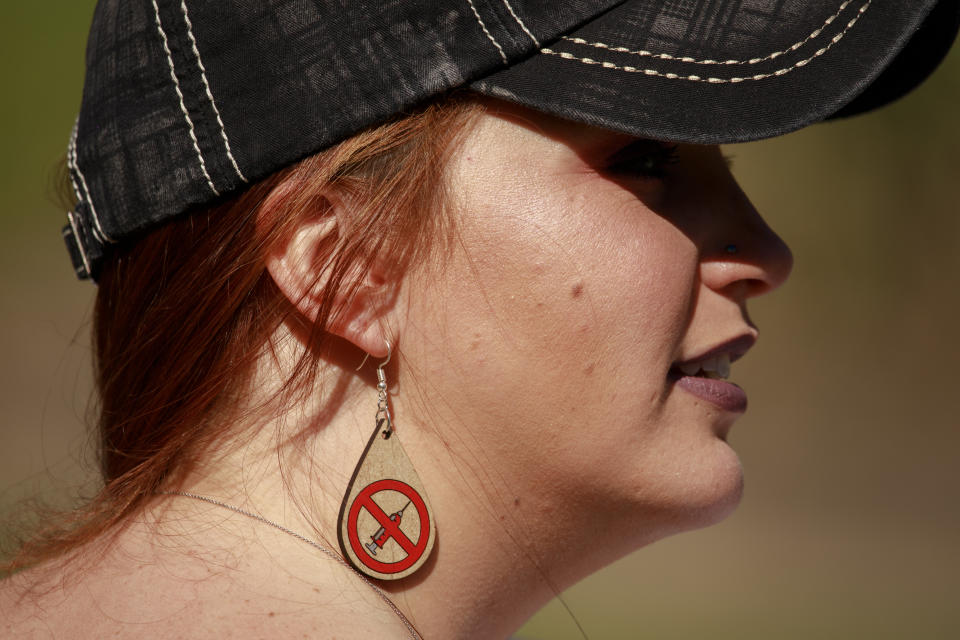 A woman in Indianapolis in April at a protest against COVID-19 vaccination outside Gov. Eric Holcomb’s mansion.