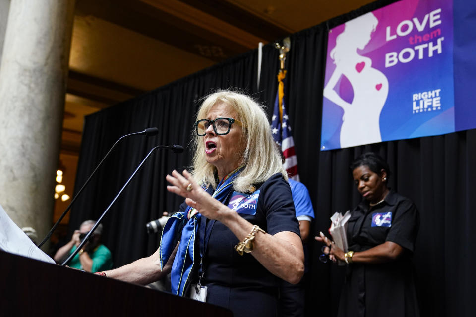 State Sen. Liz Brown, R-Fort Wayne, speaks at a rally of anti-abortion supporters as the Indiana Senate Rules Committee met to consider a Republican proposal to ban nearly all abortions in the state during a hearing at the Statehouse in Indianapolis, Tuesday, July 26, 2022. (AP Photo/Michael Conroy)