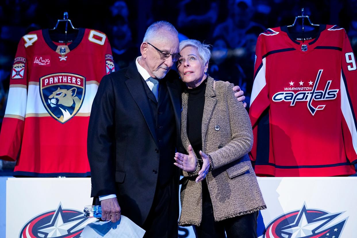 Mar 30, 2024; Columbus, Ohio, USA; Jeff Rimer hugs his wife, Ferrel, as the legendary broadcaster is honored prior to the NHL hockey game between the Columbus Blue Jackets and the Pittsburgh Penguins at Nationwide Arena. Rimer is retiring at the end of the season.