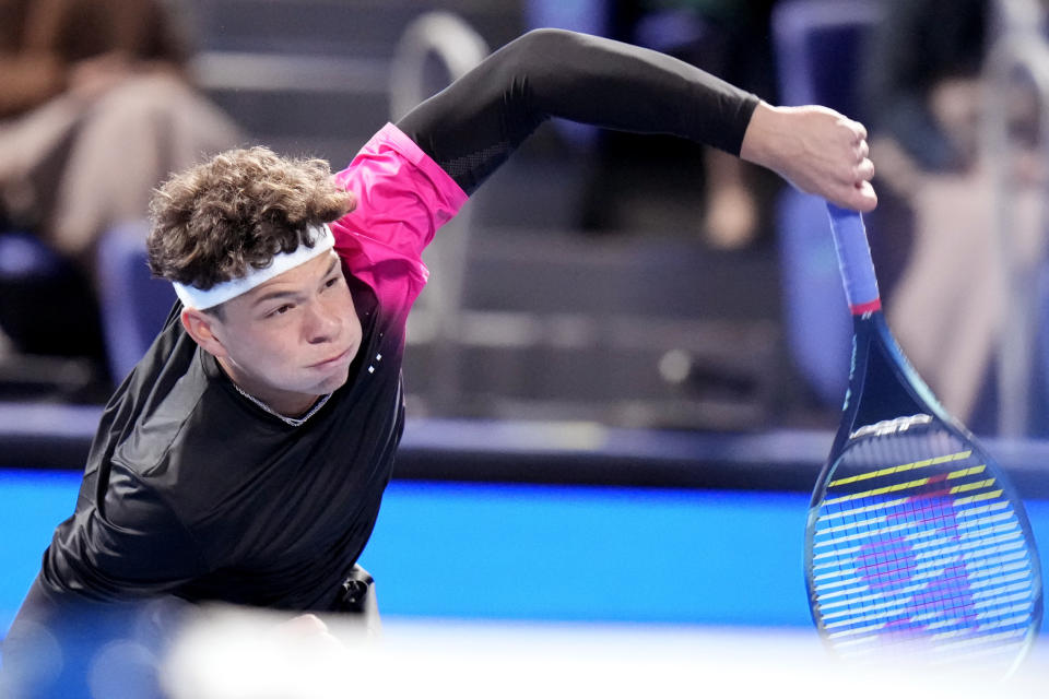 Ben Shelton of the U.S. serves to Aslan Karatsev of Russia during the men's singles final of Japan Open tennis championships in Tokyo, Japan, Sunday, Oct. 22, 2023.(AP Photo/Shuji Kajiyama)