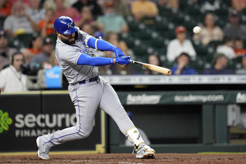 Kansas City Royals' Emmanuel Rivera hits a RBI double against the Houston Astros during the second inning of a baseball game Monday, Aug. 23, 2021, in Houston. (AP Photo/David J. Phillip)