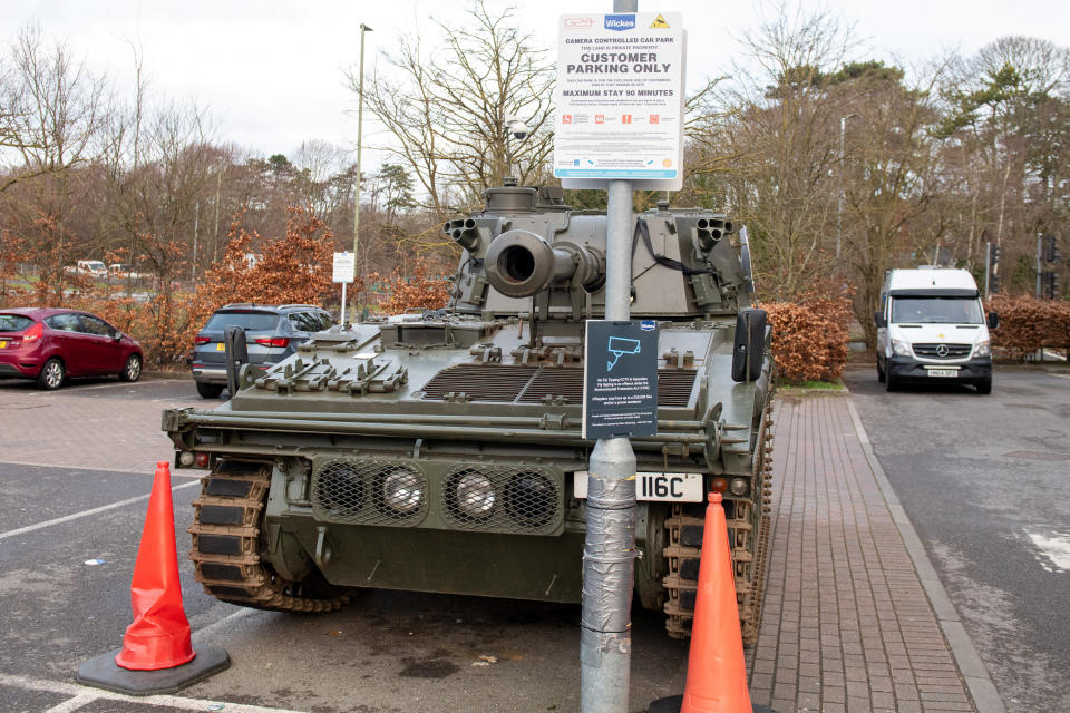 Tank parked outside of Wickes in Basingstoke, to protest against a customer's 'poor quality' kitchen fit, has now had a 14 day removal notice placed on to it. Basingstoke. January 30 2024. See SWNS story SWLStank.A man who parked a tank outside a Wickes in protest over a kitchen has been told it will be removed in 14 days - but says he's not budging.Paul Gibbons, 63, drove the vehicle to the Basingstoke store in a row over some work.Fed-up Paul has demanded a refund from Wickes for his â€œpoor qualityâ€ Â£25,000 kitchen installation at his home last February.He says it has been plagued with issues including mould under the sink, badly fitting units with a poor finish and one heavy drawer nearly collapsing on his dog.
