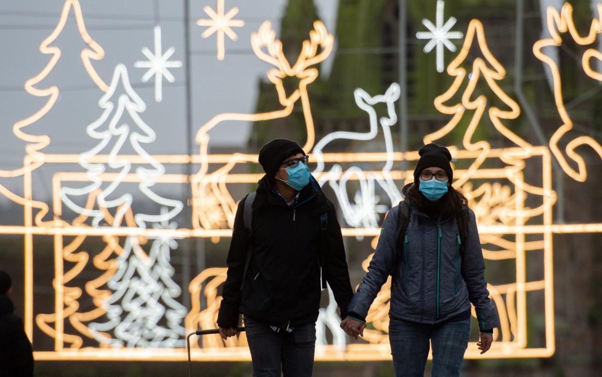 A couple walk in Birmingham - Jacob King/PA Wire