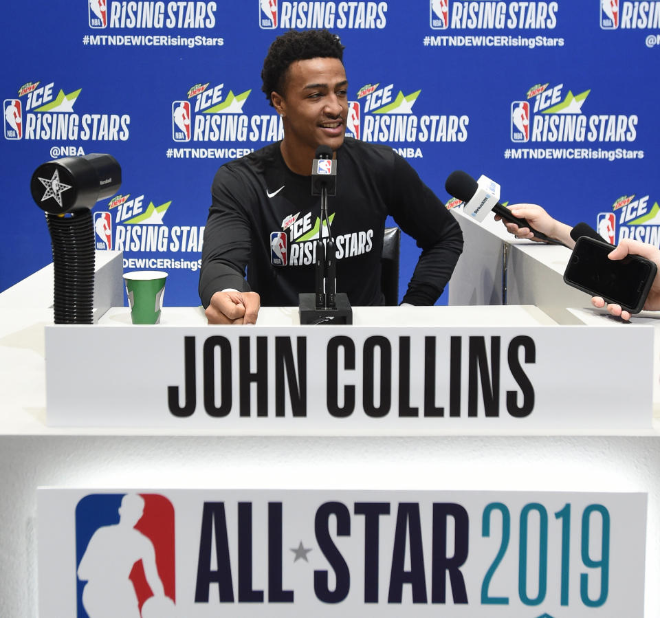 John Collins talks to the media during the 2019 NBA All-Star Rising Stars practice and media availability on Friday in Charlotte, North Carolina. (Photo by Juan Ocampo/NBAE via Getty Images)