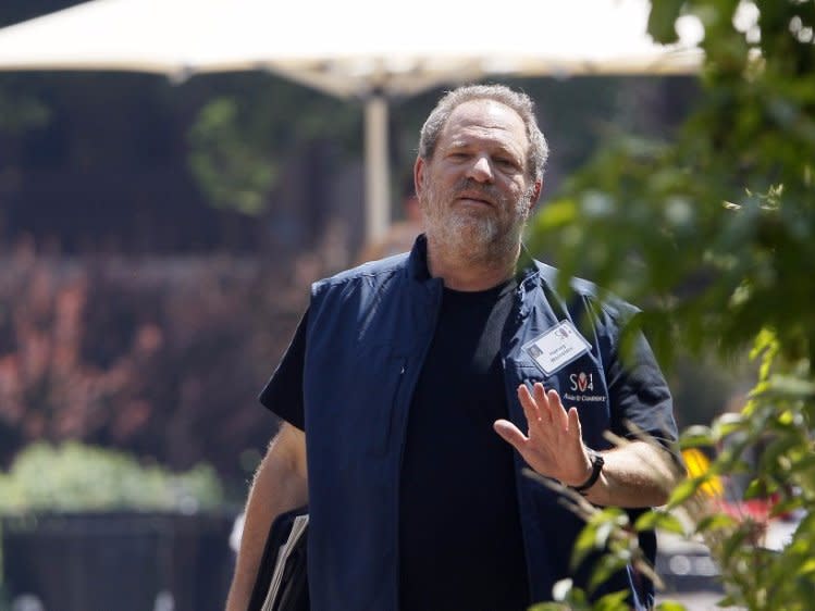 FILE PHOTO: Hollywood film producer Harvey Weinstein of The Weinstein Company gestures during a break on the first day of the Allen and Co. media conference in Sun Valley, Idaho July 9, 2014.   REUTERS/Rick Wilking