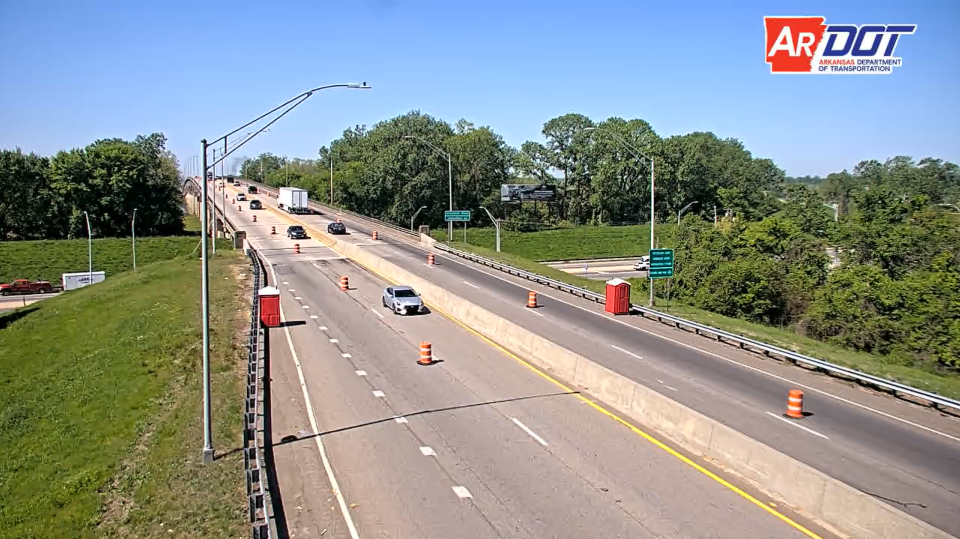 Traffic on Interstate 540 near the 4th Street exit is narrowed to one lane in both directions at the Arkansas River bridge where resurfacing work has started and will last until August.