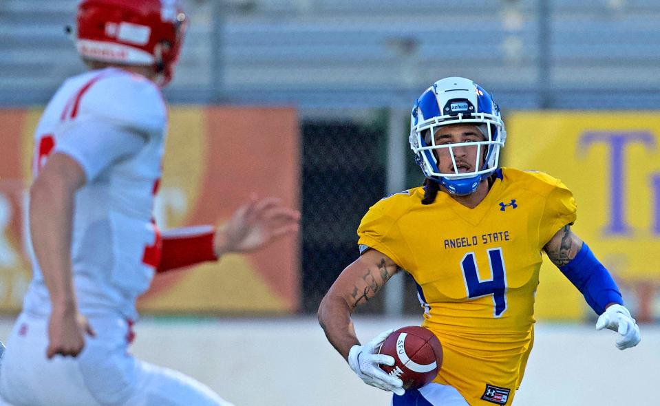 Devin Washington (4) rushes the ball for Angelo State University during a game against Simon Fraser on Saturday, Oct. 23, 2021.