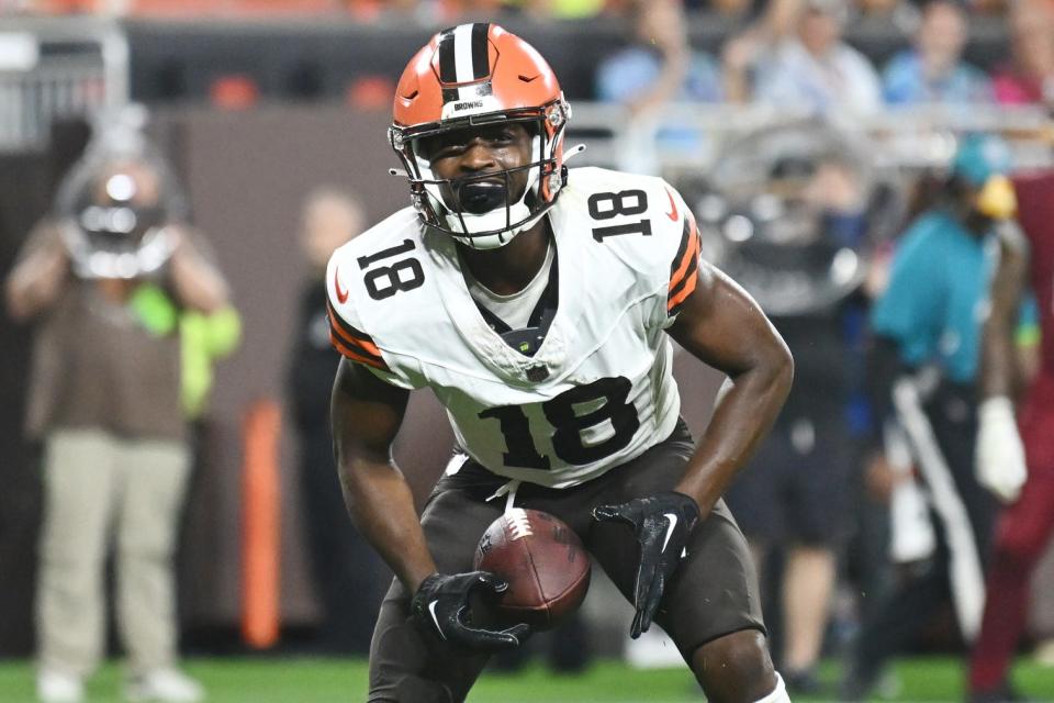 Cleveland Browns wide receiver David Bell celebrates after scoring a touchdown against the Washington Commanders at Cleveland Browns Stadium.