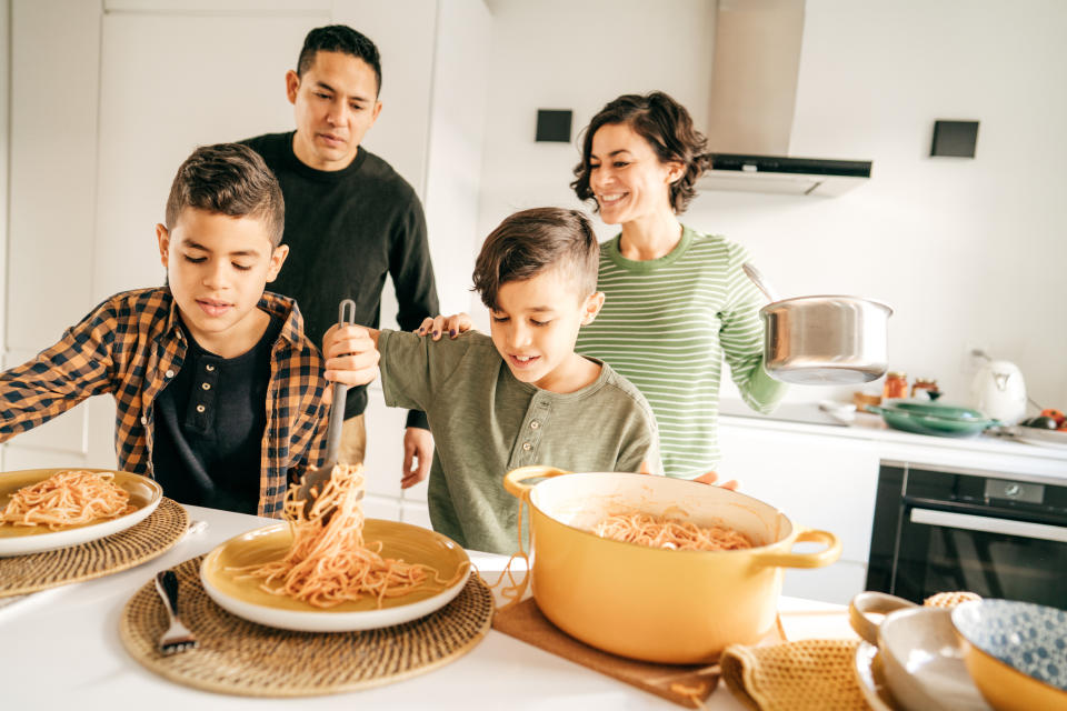 family making dinner