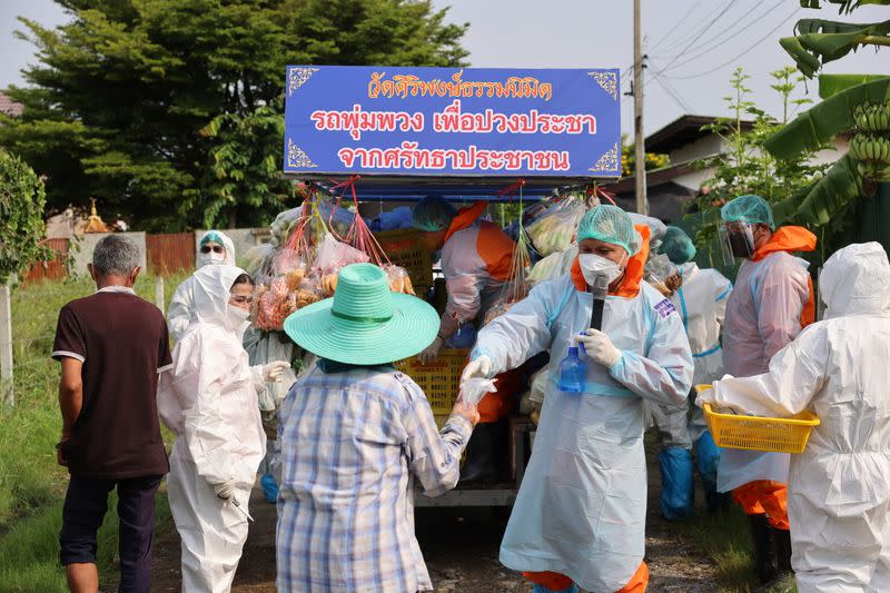 Thai Buddhist monks craft traditional grocery truck to donate food during the coronavirus disease (COVID-19) pandemic