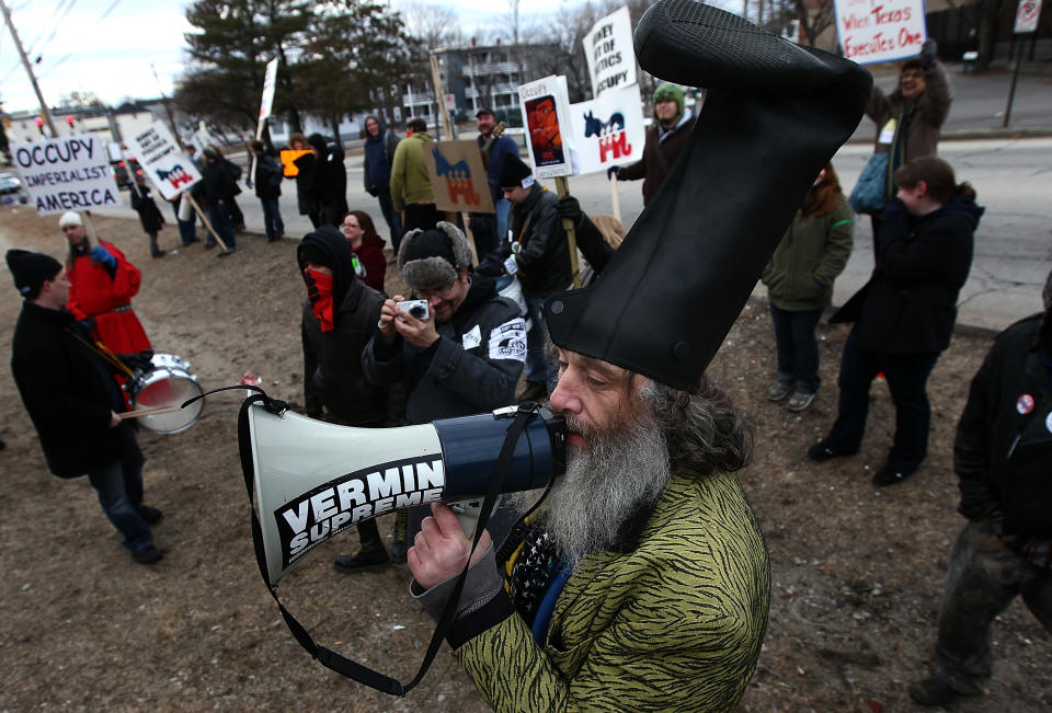 Fringe candidate Vermin Supreme demonstrates with Occupy Boston protesters.