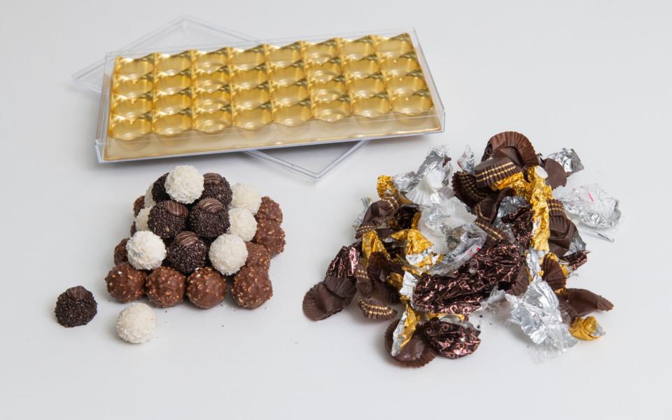 The only parts of the popular hazelnut treats' packaging which can be recycled are the paper cases and the gold plastic tray in which they sit - JULIAN SIMMONDS