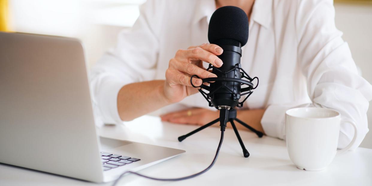 Woman Using Microphone Laptop