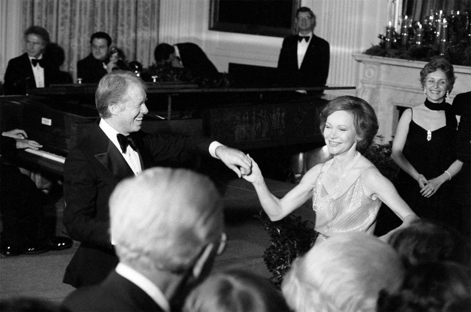 President <strong>Jimmy Carter</strong> and First Lady <strong>Rosalynn Carter</strong> take a turn on the dance floor at the White House Christmas Ball, December 1978.