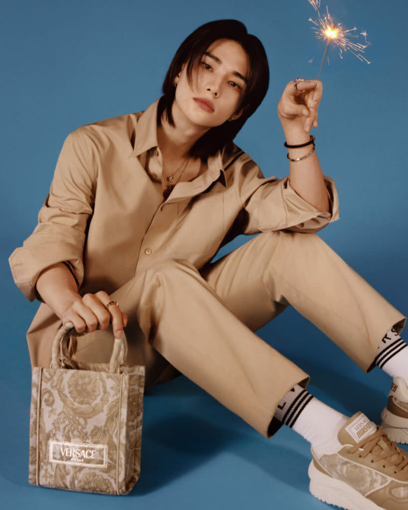 Hyunjin wears cotton poplin shirt; cotton chinos; Barocco jacquard Odissea sneakers; Athena mini tote bag (Picture: Versace, Photography: Angelo Pennetta)