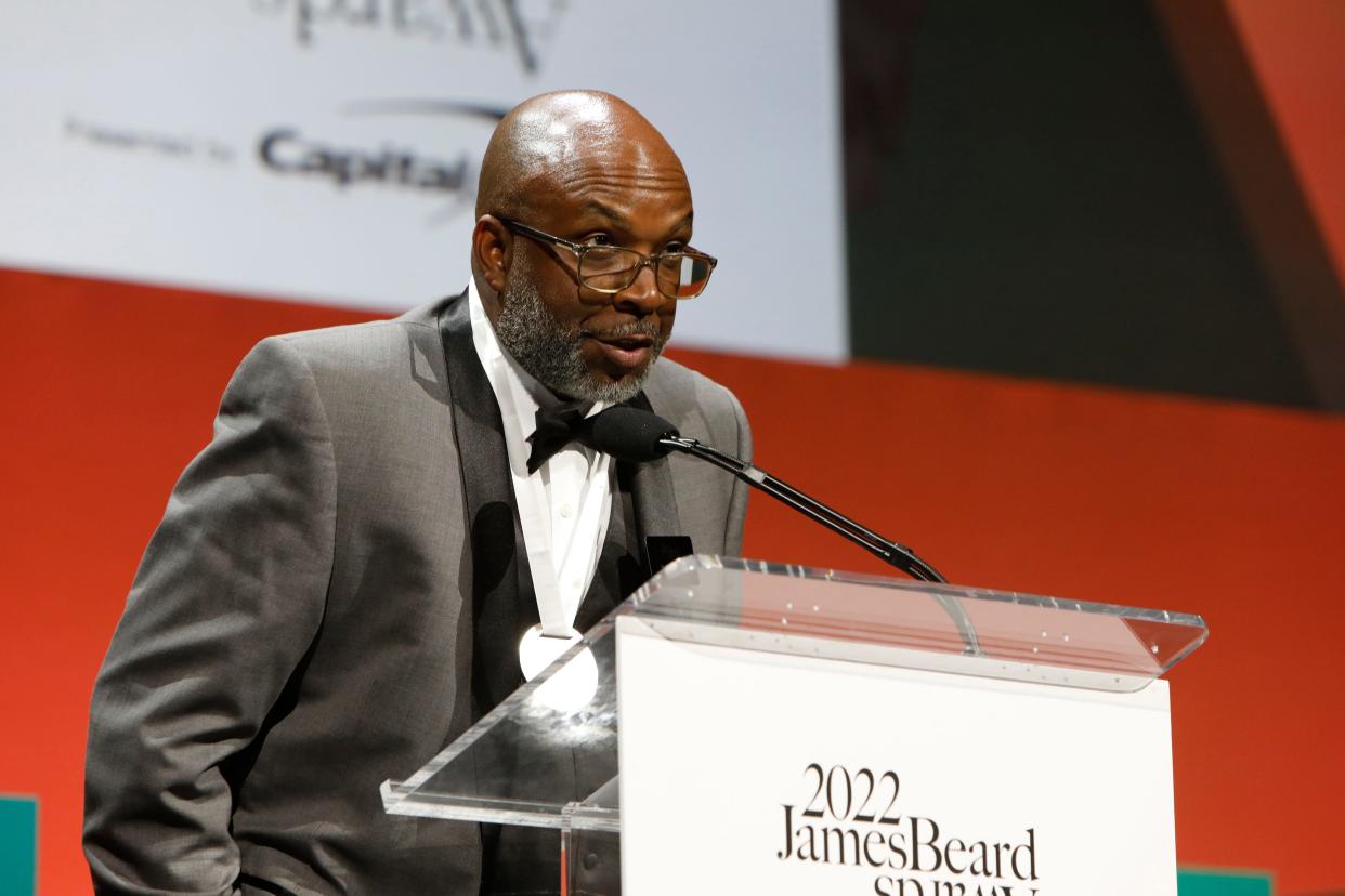 Ricky Moore of Saltbox Seafood Joint in Durham, North Carolina, accepts the 2022 James Beard Award for Outstanding Chef: South at the annual gala the at Lyric Opera on June 13, 2022 in Chicago. (Getty Images for James Beard Foundation )