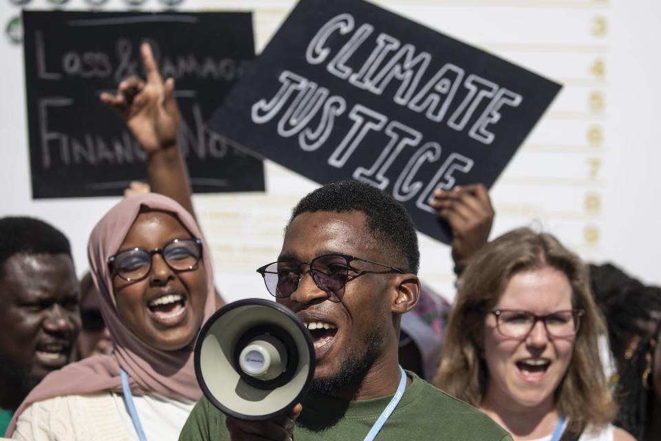 A few small pop-up protests appeared at the COP27 venue in Egypt, rather than the usual mass street marches. <a href="https://www.gettyimages.com/detail/news-photo/november-2022-egypt-sharm-el-sheikh-members-of-the-asian-news-photo/1244658094" rel="nofollow noopener" target="_blank" data-ylk="slk:Gehad Hamdy/picture alliance via Getty Images;elm:context_link;itc:0;sec:content-canvas" class="link ">Gehad Hamdy/picture alliance via Getty Images</a>