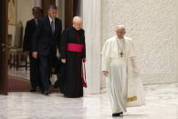 Pope Francis arrives to attend his weekly general audience in the Paul VI hall at the Vatican, Wednesday, Aug. 4, 2021. It was Francis' first general audience since undergoing planned surgery to remove half his colon for a severe narrowing of his large intestine on July 4, his first major surgery since he became pope in 2013. (AP Photo/Riccardo De Luca)