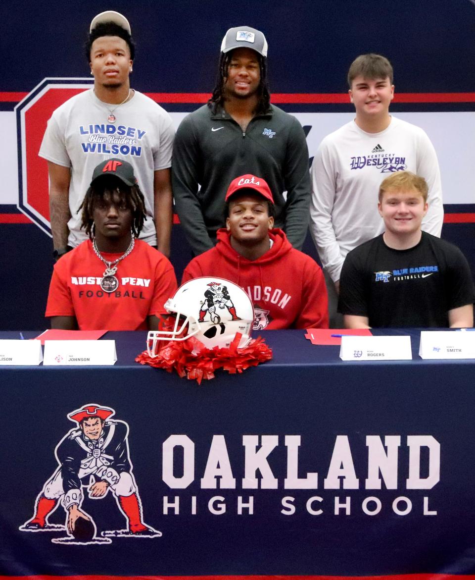 Oakland football players signed during a National Signing Day ceremony at Oakland High School, on Wednesday, Feb. 7, 2024. Top row left to right: Jeremiah Buntyn (Lindsey Wilson), Korey Smith (MTSU, walk-on), Noah Rogers (Kentucky Weselyan); front row left to right Stephen Ellison (Austin Peay), Tre Johnson (Davidson College) and Jacob Taylor (MTSU, walk-on).