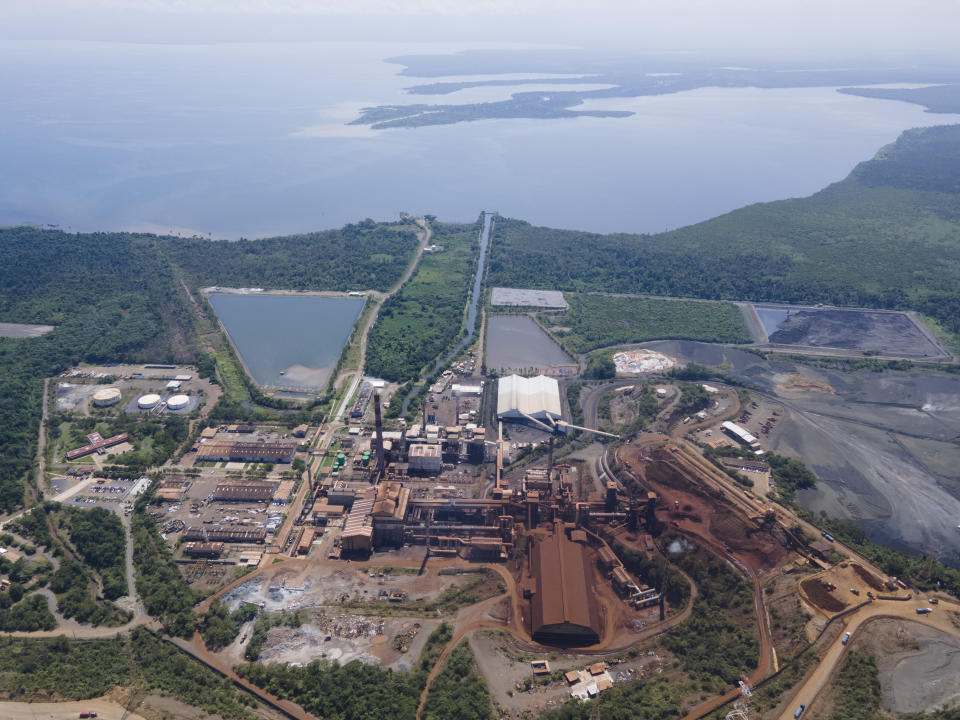 The nickel mine run by the Swiss-based Solway Investment Group stands next to Izabal Lake in El Estor in the northern coastal province of Izabal, Guatemala, Monday, Oct. 25, 2021. The Guatemalan government has declared a month-long, dawn-to-dusk curfew and banned pubic gatherings following protests against this mine. (AP Photo/Moises Castillo)