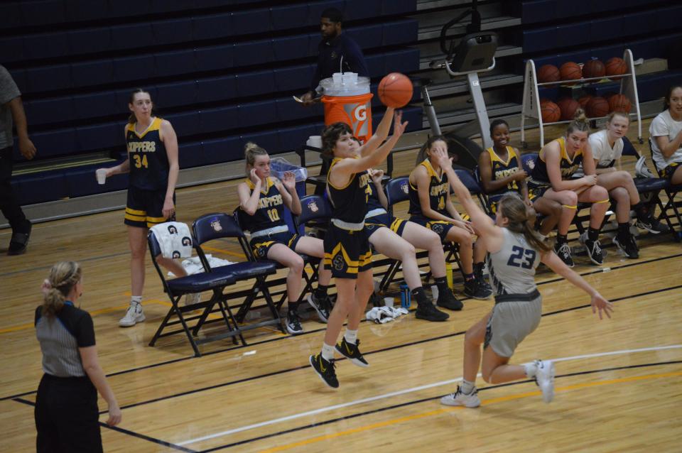 SC4 women's basketball's Lily Connelly shoots a 3-pointer during a game earlier this season. She's currently averaging 10.4 points per game on 47.1% shooting.