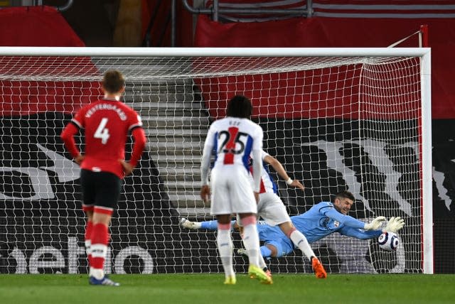 Fraser Forster saves Luka Milivojevic's penalty