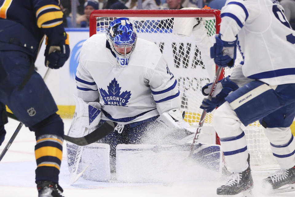 Toronto Maple Leafs goalie Frederik Andersen (31) makes a pad save during the third period of the team's NHL hockey game against the Buffalo Sabres, Sunday, Feb. 16, 2020, in Buffalo, N.Y. (AP Photo/Jeffrey T. Barnes)