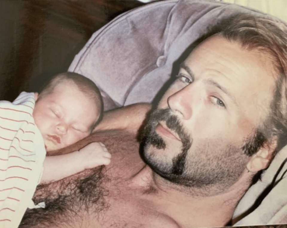 A baby Rumer Willis sleeps on the chest of her famous dad, Bruce Willis (Rumer Willis / Instagram)
