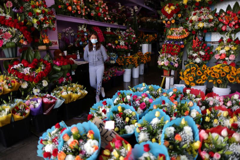 Florist Alvarez waits for customers at her store ahead of Valentine's Day in Los Angeles