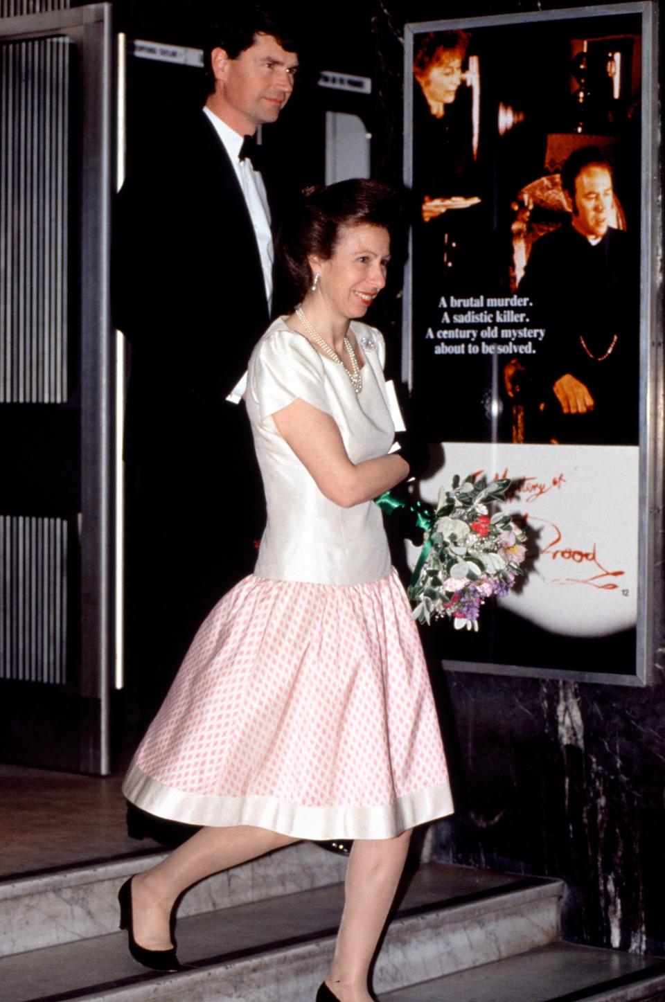 Princess Anne leaving a film premiere with her husband Tim Laurence on April 28, 1993.