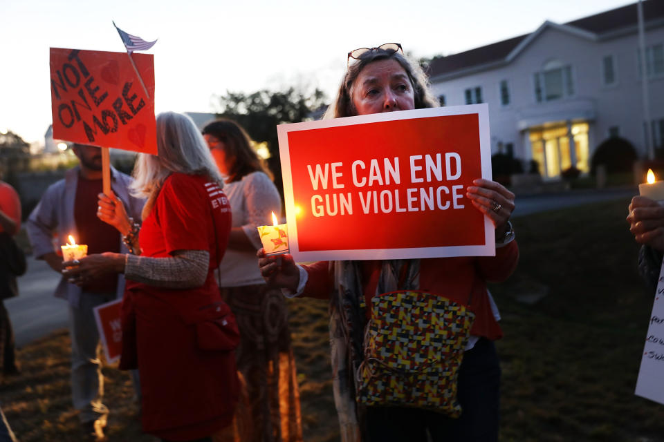 <p>Dozens of people attend a vigil remembering the people killed in Sunday’s shooting in Las Vegas and calling for action against guns on Oct. 4, 2017 in Newtown, Conn. (Photo: Spencer Platt/Getty Images) </p>