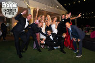 <p>Of course, Heather's <em>Selling Sunset</em> castmates came to celebrate her special day! Seen here (from left to right), is the show's creator Adam DiVello, Jason Oppenheim, Chrishell Stause, Mary Fitzgerald, show producer Skyler Wakil, Emma Hernan, Heather, Tarek, Davina Potratz and Brett Oppenheim. </p>