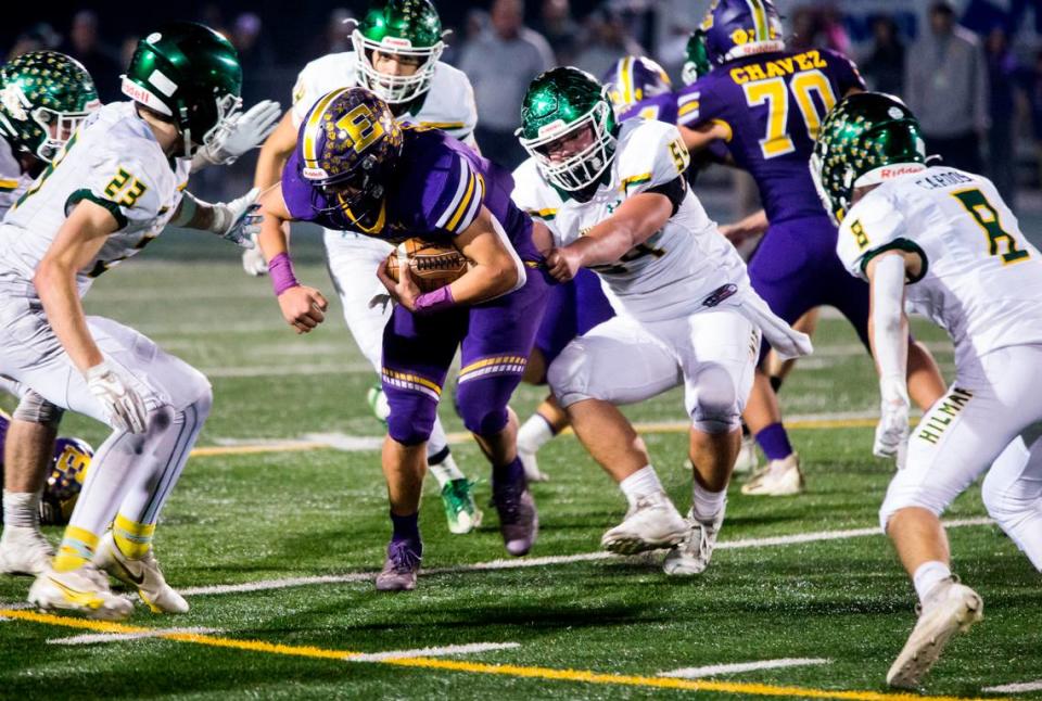 Escalon Highs Ryker Peters, 1, works his way through Hilmars defense. Escalon High School took on Hilmar High football during the 2021 CIF Sac-Joaquin Football Playoffs - Division V at Saint Mary’s High School in Stockton, Ca. Escalon came out on top as the champions with a 20-13 win over Hilmar.