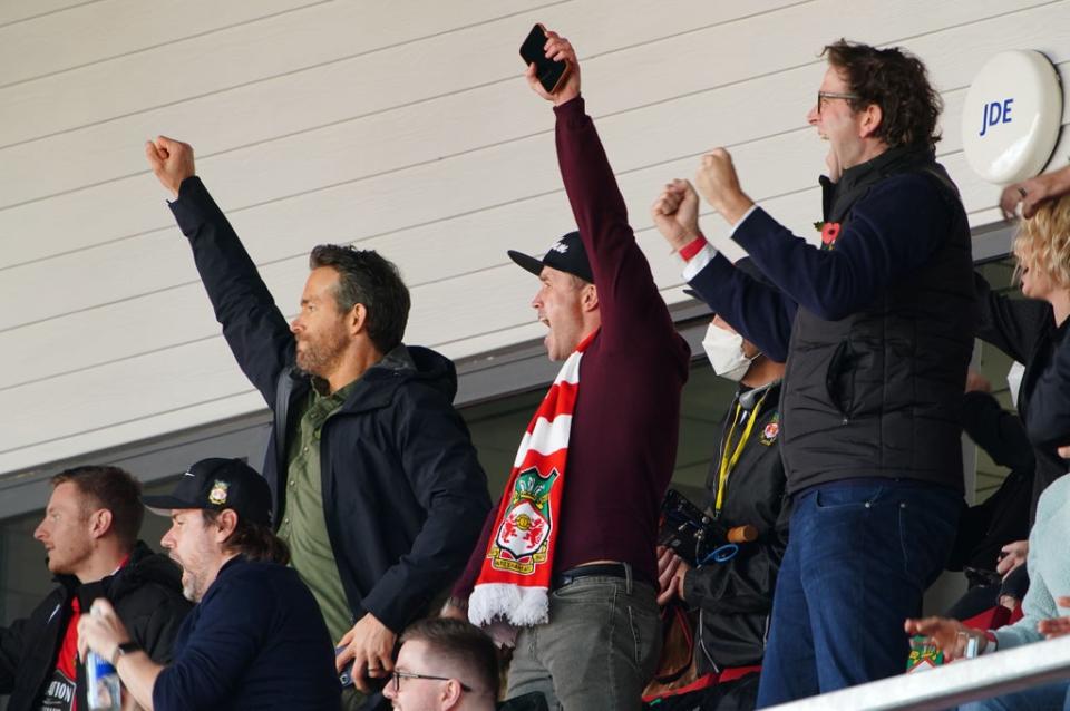 Ryan Reynolds and Rob McElhenney celebrate (PA)