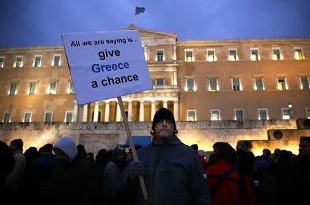A man takes part in a anti-austerity pro-government demo in front of the parliament in Athens February 11, 2015. REUTERS/Yannis Behrakis