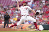 Cincinnati Reds starting pitcher Graham Ashcraft throws during the third inning of the team's baseball game against the New York Mets on Wednesday, July 6, 2022, in Cincinnati. (AP Photo/Jeff Dean)