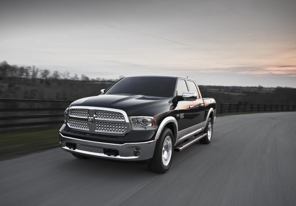 <b>Best Large Pickup Truck: <a href="http://autos.yahoo.com/ram/1500-crew-cab-4x2/" data-ylk="slk:2013 Ram 1500;elm:context_link;itc:0;sec:content-canvas" class="link ">2013 Ram 1500</a></b><br>No segment boasts greater owner loyalty than the full-size truck segment, so we fully recognize that your idea of the best truck is likely going to be determined by whatever is parked proudly outside. Free from such loyalties, however, we're quite confident in our verdict on the Ram 1500, a truck that stands out by making its owner's life easier and more comfortable while still offering the sort of capability demanded of a pickup. Allow us to present the evidence.<br><br>Exhibit A is the eight-speed automatic transmission fitted to all engines starting in 2014. Not only does it enhance fuel economy, but it also aids towing by limiting gear hunting and possibly preventing the purchase of a different axle ratio. Exhibit B are the engines themselves, including a new-for-2014 turbodiesel that promises better efficiency than the base V6 and towing capability similar to that of the Hemi V8. Exhibit C is a comfortable, classy cabin of quality materials and easy-to-use controls. Exhibit D is a driving experience that feels less trucky and cumbersome than its rivals. And finally to end this tiresome premise, Exhibit E is the option of rear coil springs or a full-on air suspension. No other truck offers these, and the result is a vastly superior ride, better vehicle control and no subsequent degradation in towing or hauling.<br><br>There isn't another full-size truck sold that offers the Ram's combination of utility, comfort and efficiency.