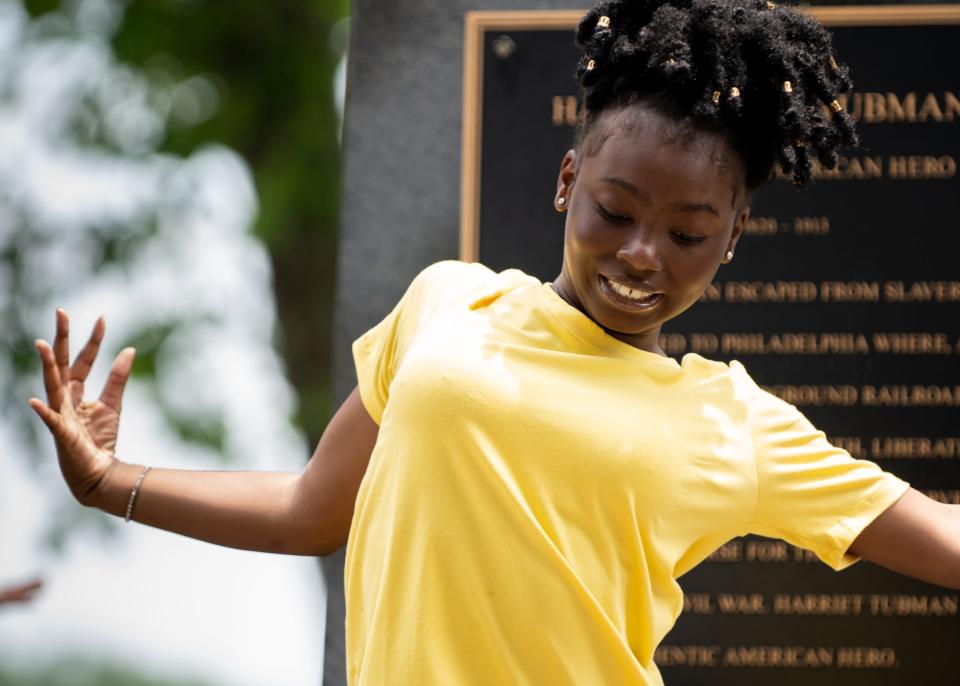 Amadi Hilliman, 12, a member of the Cherubim Glory Carriers from School of Light Church in Cherry Hill, New Jersey, dances during the First Annual Lower Bucks County Juneteenth Celebration in Bristol Borough on Saturday, June 19, 2021.