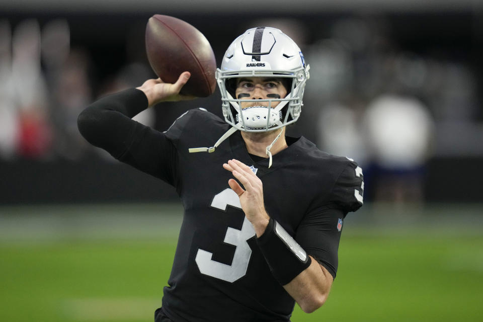 FILE - Las Vegas Raiders quarterback Jarrett Stidham (3) warms up before an NFL football game against the Kansas City Chiefs, Jan. 11, 2023, in Las Vegas. The Broncos have agreed on a deal Monday, March 13, 2023, with quarterback Stidham to be Russell Wilson’s backup. (AP Photo/John Locher, File)