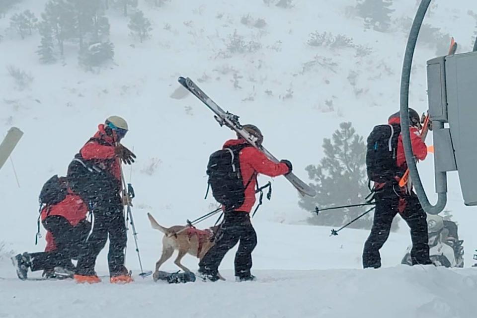 Rescues crews work at the scene of an avalanche at the Palisades Tahoe ski resort on Wednesday, Jan. 10, 2024, near Lake Tahoe. The avalanche roared through a section of expert trails at the ski resort as a major storm with snow and gusty winds moved into the region, authorities said.