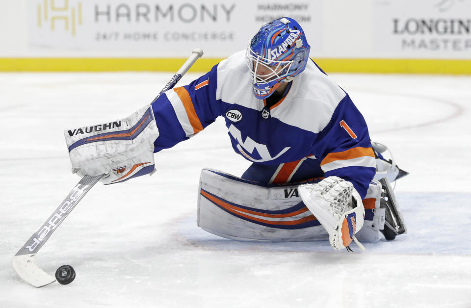 New York Islanders goalie Thomas Greiss, of Germany, makes a save against the Philadelphia Flyers during the third period of an NHL hockey game, Sunday, March 3, 2019, in Uniondale, N.Y. (AP Photo/Kathy Willens)
