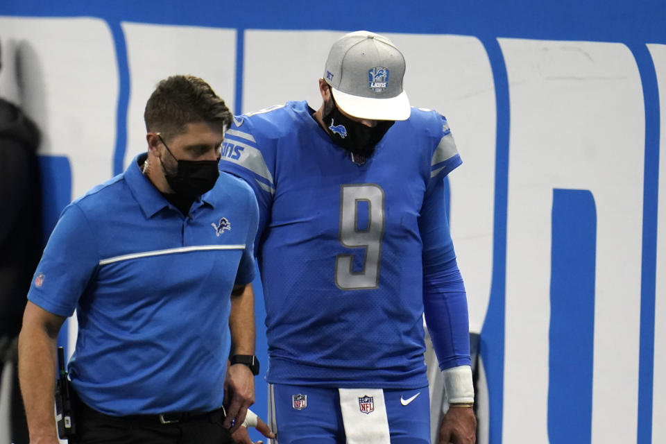 Detroit Lions quarterback Matthew Stafford (9) walks off the field during the second half of an NFL football game against the Green Bay Packers, Sunday, Dec. 13, 2020, in Detroit. (AP Photo/Paul Sancya)